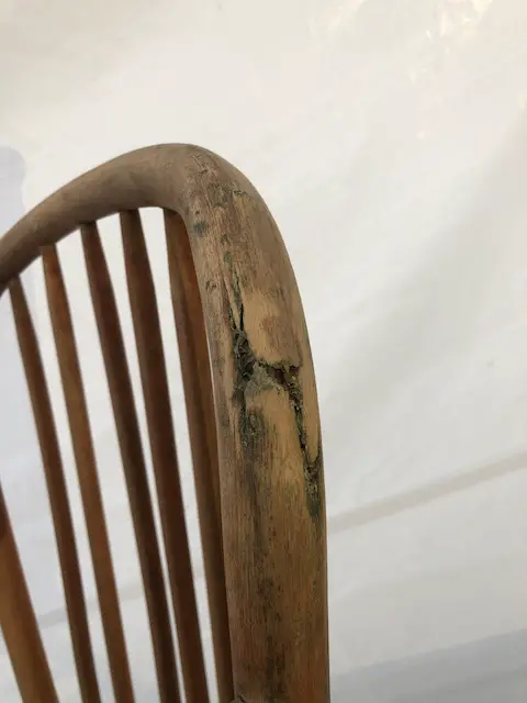 sanding damaged chair