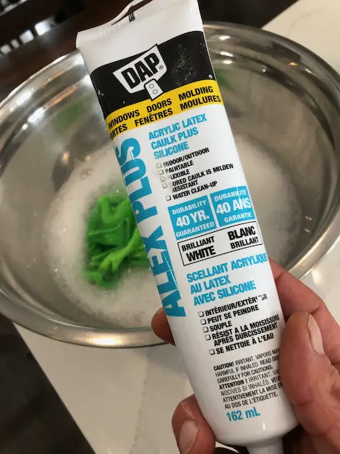 DAP Acrylic Latex Caulk to fix gaps in moulding