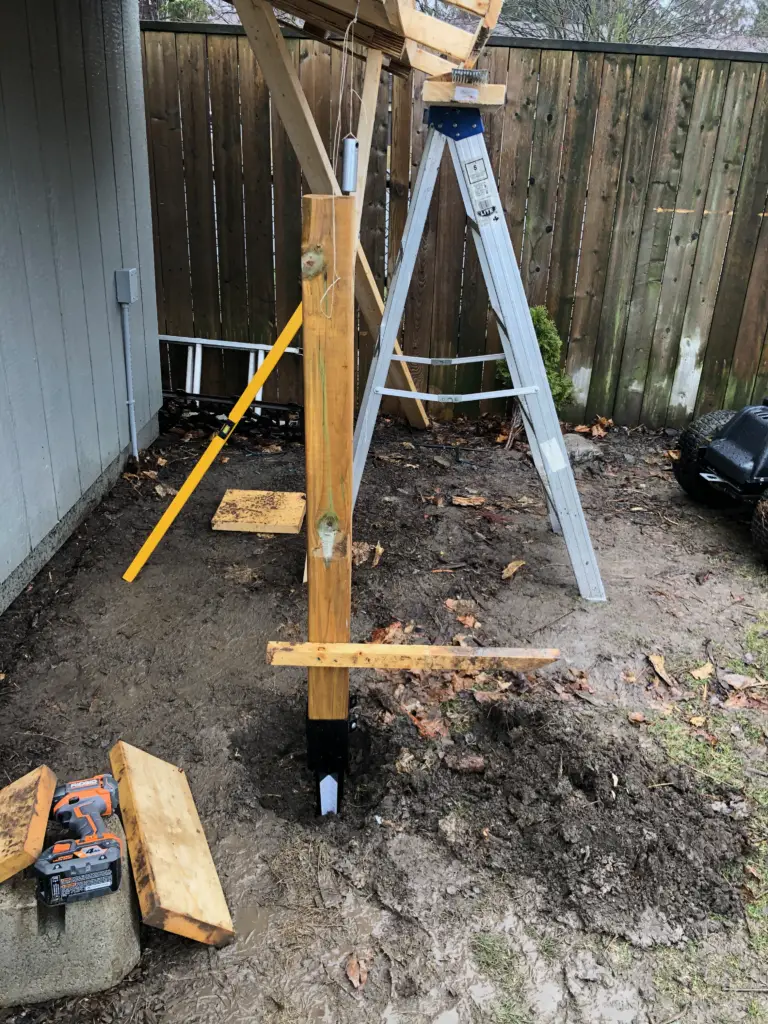 using a pendulum weight to locate the posts on a simple diy carport shed