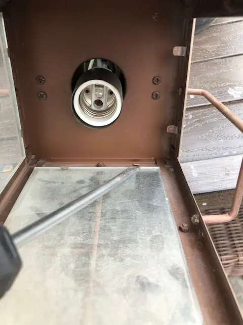 removing glass from outside light fixture
