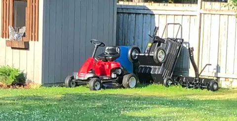 residential lawn equipment Riding lawn mower, dump wagon, aerator
