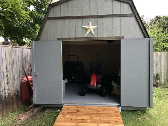 Large 10x10 barn style shed upgrade for a backyard makeover