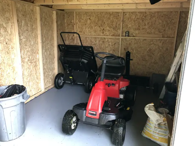 Large barn style storage shed to store yard maintenance equipment